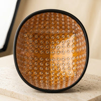 The removable dome insert of the Luxuel Laser Cap 272, its amber board densely filled with round lensed laser emitters across the full oval